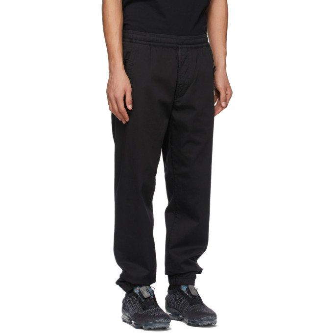 STONE ISLAND BLACK GHOST TROUSERS