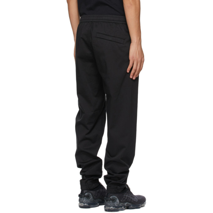 STONE ISLAND BLACK GHOST TROUSERS