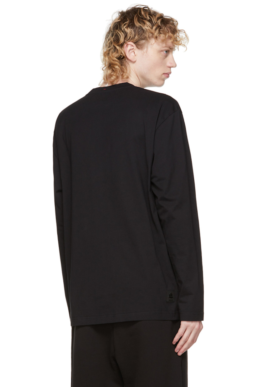 Long sleeve cotton jersey T-shirt in black. Rib knit crewneck collar. Logo printed in white at front and sleeve. Tonal rubberized logo patch at back hem.

Supplier color: Black