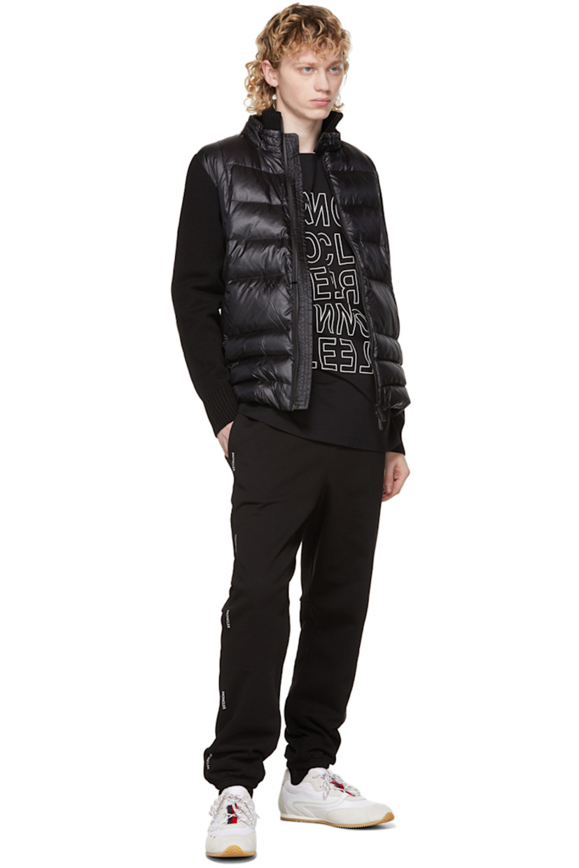 Long sleeve cotton jersey T-shirt in black. Rib knit crewneck collar. Logo printed in white at front and sleeve. Tonal rubberized logo patch at back hem.

Supplier color: Black