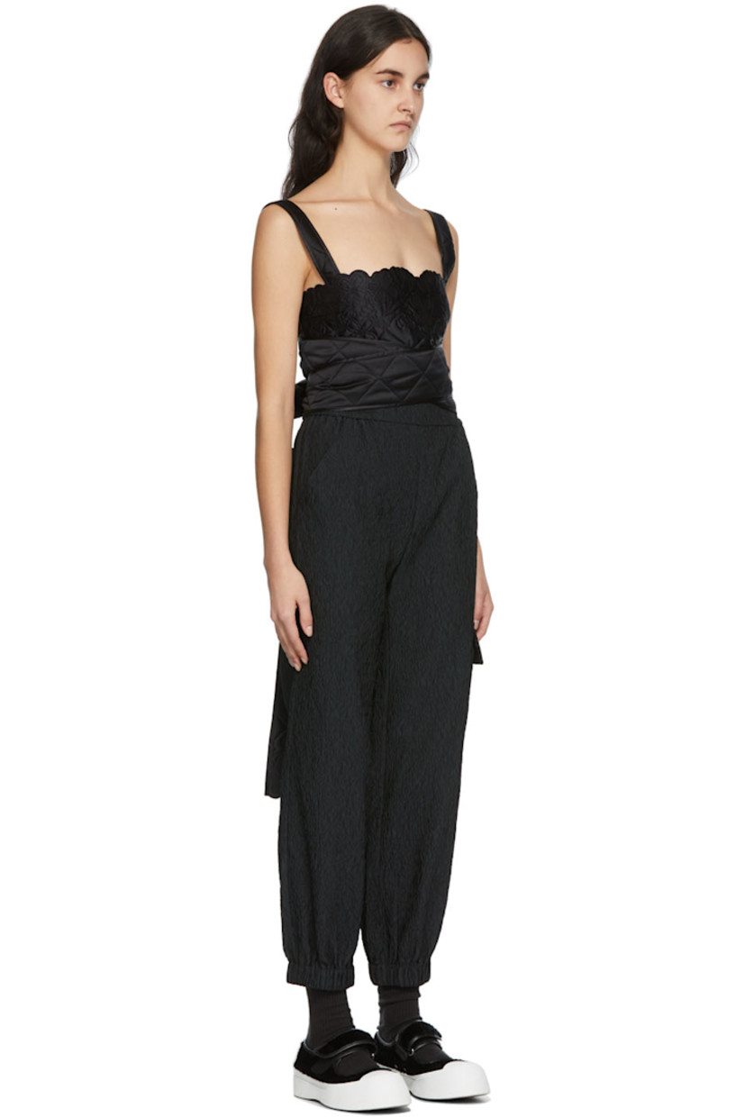 Sleeveless quilted cotton and silk-blend tank top in black.

· Tonal floral pattern embroidered throughout
· Wrap around self tie fastening at sides

Supplier color: Black