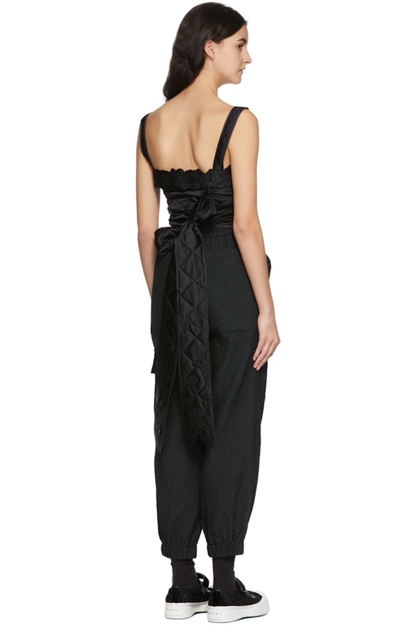 Sleeveless quilted cotton and silk-blend tank top in black.

· Tonal floral pattern embroidered throughout
· Wrap around self tie fastening at sides

Supplier color: Black