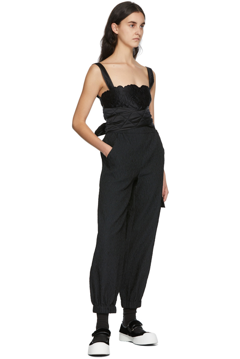 Sleeveless quilted cotton and silk-blend tank top in black.

· Tonal floral pattern embroidered throughout
· Wrap around self tie fastening at sides

Supplier color: Black