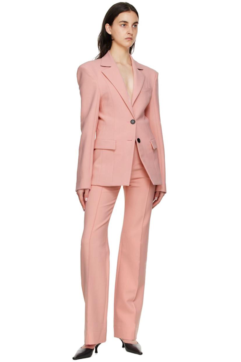 Double-faced stretch polyester and virgin wool-blend canvas blazer. 

· Notched lapel 
· Two-button closure
· Welt pocket and flap pockets 
· Four-button surgeon's cuffs
· Central vent at back hem 
· Fully lined

Supplier color: Pink