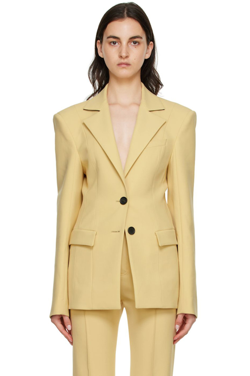Stretch double-faced woven polyester and virgin wool-blend canvas blazer. 

· Notched lapel 
· Button closure
· Welt pocket and flap pockets 
· Four-button surgeon's cuffs
· Central vent at back hem 
· Fully lined

Available exclusively at SSENSE.

Supplier color: Vanilla