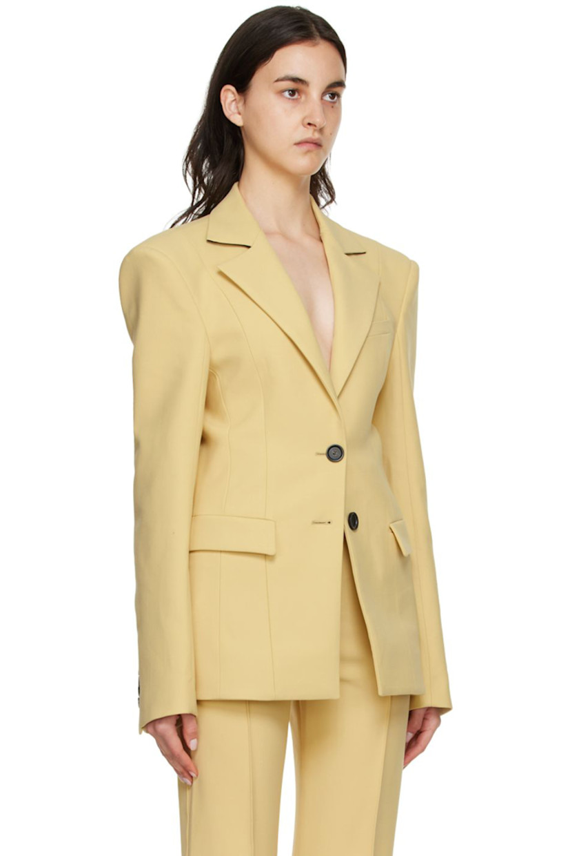 Stretch double-faced woven polyester and virgin wool-blend canvas blazer. 

· Notched lapel 
· Button closure
· Welt pocket and flap pockets 
· Four-button surgeon's cuffs
· Central vent at back hem 
· Fully lined

Available exclusively at SSENSE.

Supplier color: Vanilla
