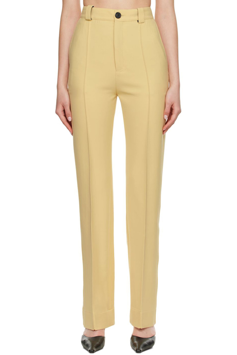 Stretch woven double-faced polyester and wool-blend trousers.

· Belt loops
· Zip-fly
· Pinched seams at front and back
· Three-pocket styling

Available exclusively at SSENSE.

Supplier color: Vanilla