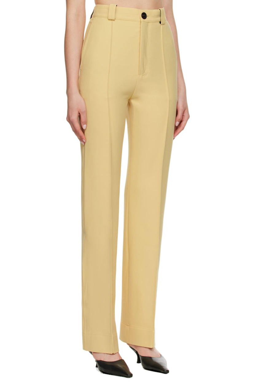 Stretch woven double-faced polyester and wool-blend trousers.

· Belt loops
· Zip-fly
· Pinched seams at front and back
· Three-pocket styling

Available exclusively at SSENSE.

Supplier color: Vanilla