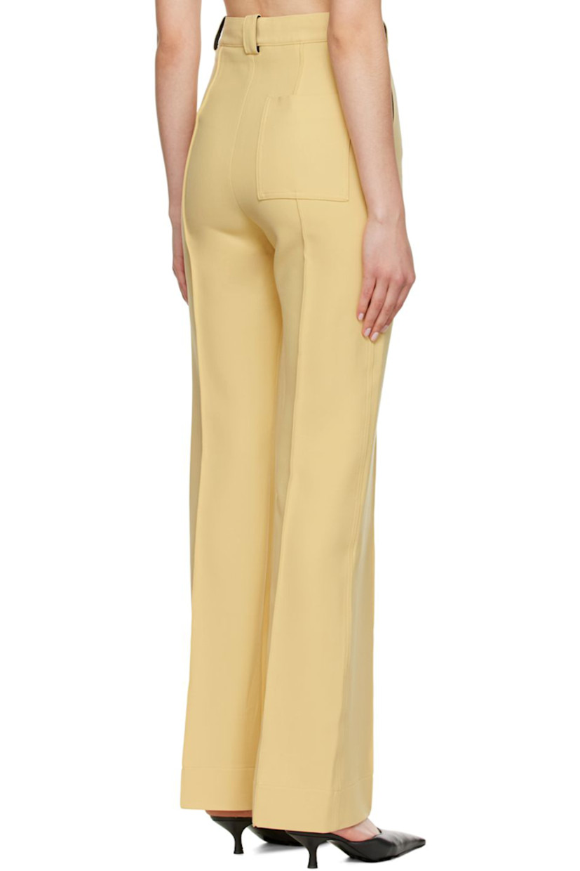 Stretch woven double-faced polyester and wool-blend trousers.

· Belt loops
· Zip-fly
· Pinched seams at front and back
· Three-pocket styling

Available exclusively at SSENSE.

Supplier color: Vanilla