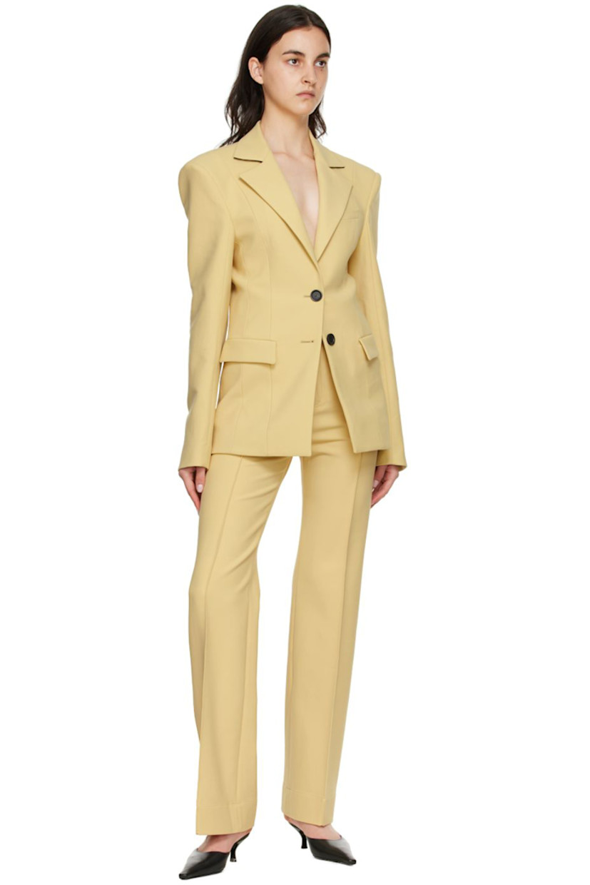 Stretch woven double-faced polyester and wool-blend trousers.

· Belt loops
· Zip-fly
· Pinched seams at front and back
· Three-pocket styling

Available exclusively at SSENSE.

Supplier color: Vanilla