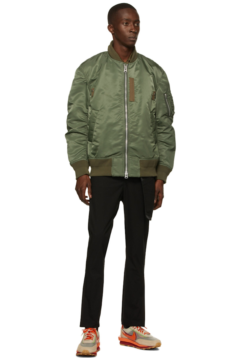 Low-top paneled transparent ripstop and suede sneakers in beige. Round toe. Double lace-up closure in grey and orange featuring buffed leather trim in green at eyerows. Twin padded tongues in orange and red. Padded collar. Signature Swoosh at sides. Logo printed in green at orange buffed leather heel tab. Sculptural foam rubber midsole. Tonal waffle treaded rubber outsole. 

Part of the Nike x sacai x CLOT collaboration. 

Supplier color: Net/Orange blaze