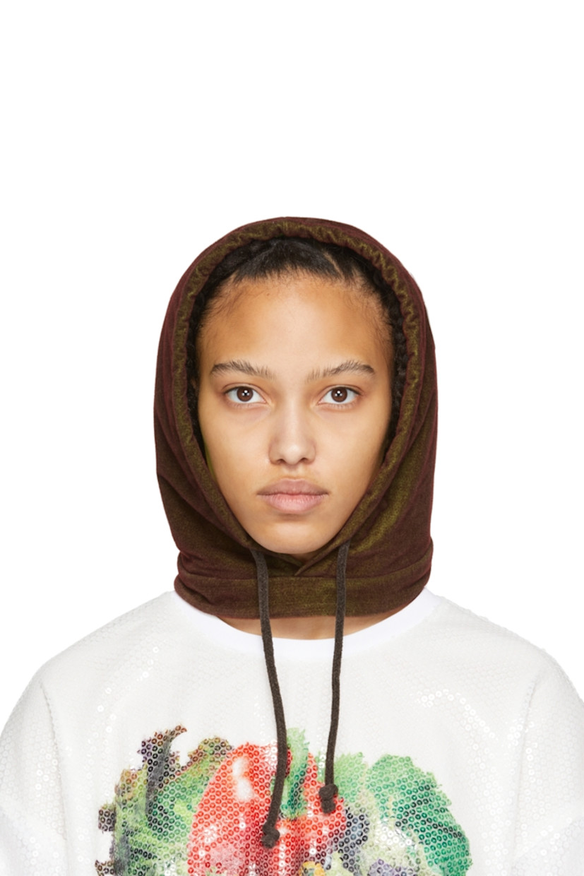 Polyurethane-coated velvet hood-style beanie in brown and green featuring embroidered logo patch in green, red, and white at face.

· Drawstring at base
· Zip closure at back
· Technical jersey lining

Supplier color: Green