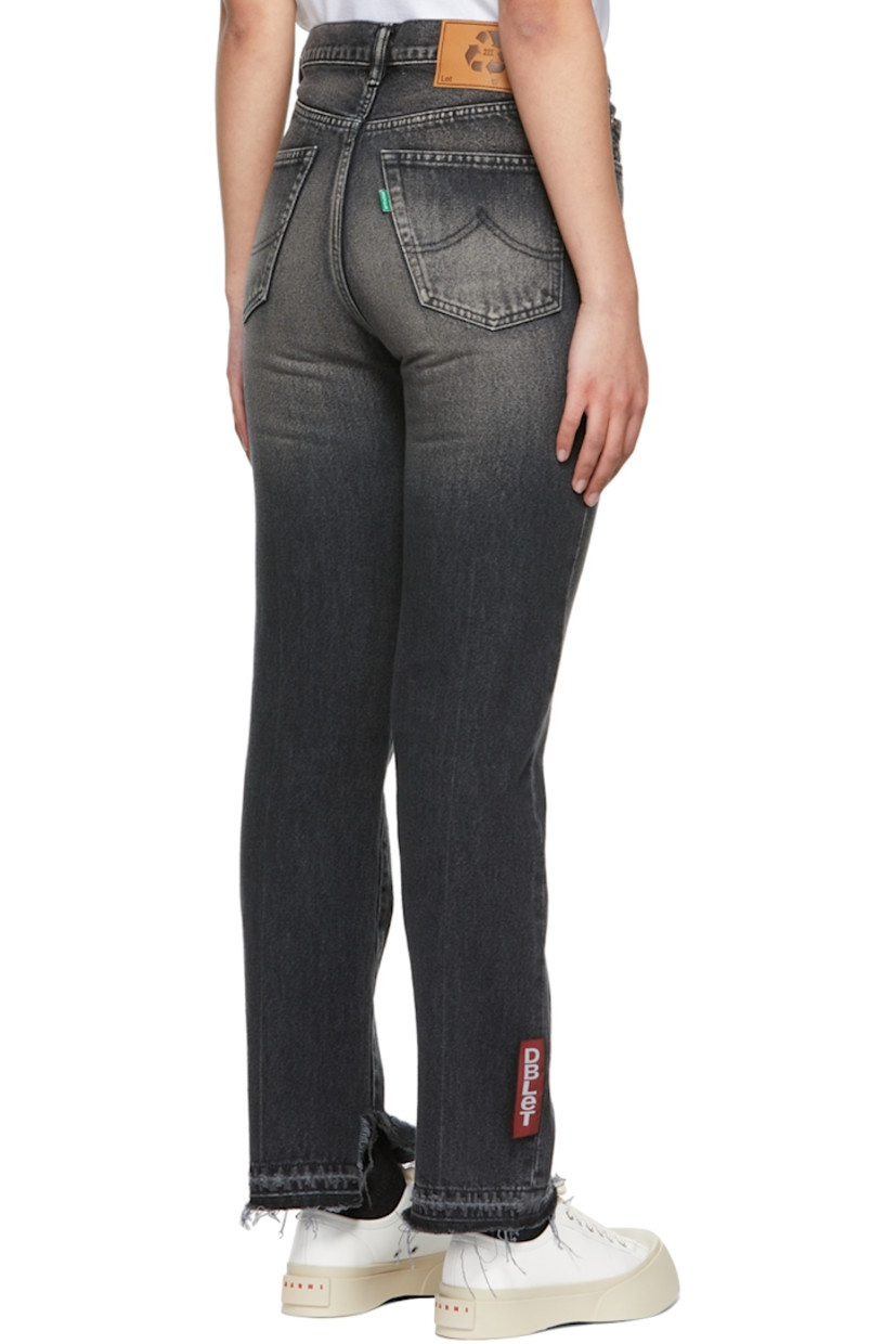 Straight-leg non-stretch recycled denim jeans in black featuring fading and whiskering throughout. 

· High-rise
· Five-pocket styling
· Belt loops at waistband
· Leather logo patch in tan at back waistband
· Button-fly
· Textile logo patch in red at cuff
· Distressing at cuffs
· Copper-tone hardware

Supplier color: Black