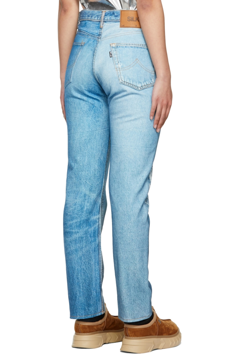 Straight-leg non-stretch denim jeans in blue featuring graphic printed throughout.

· High-rise
· Five-pocket styling
· Belt loops at waistband
· Leather logo patch in tan at back waistband
· Button-fly
· Copper-tone and silver-tone hardware
· Contrast stitching in tan

Supplier color: Indigo