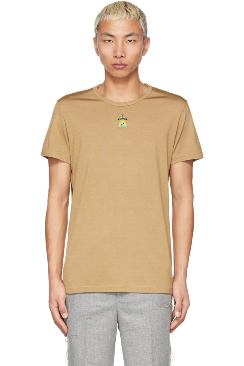 Short sleeve jersey T-shirt in tan. 

· Rib knit crewneck collar
· Graphic embroidered at chest

Supplier color: Latte