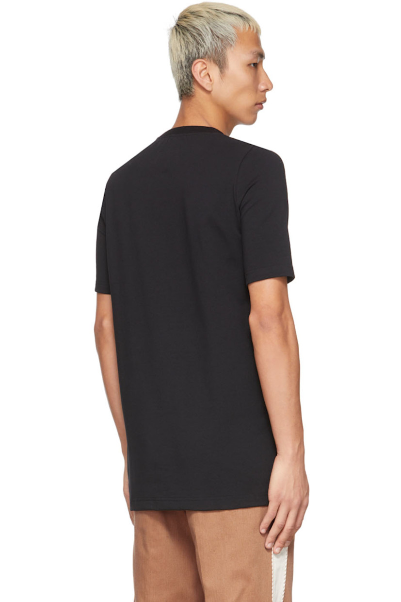 Short sleeve cotton-blend rib knit T-shirt in black featuring bonded graphic at front. Crewneck collar.

Supplier color: Black