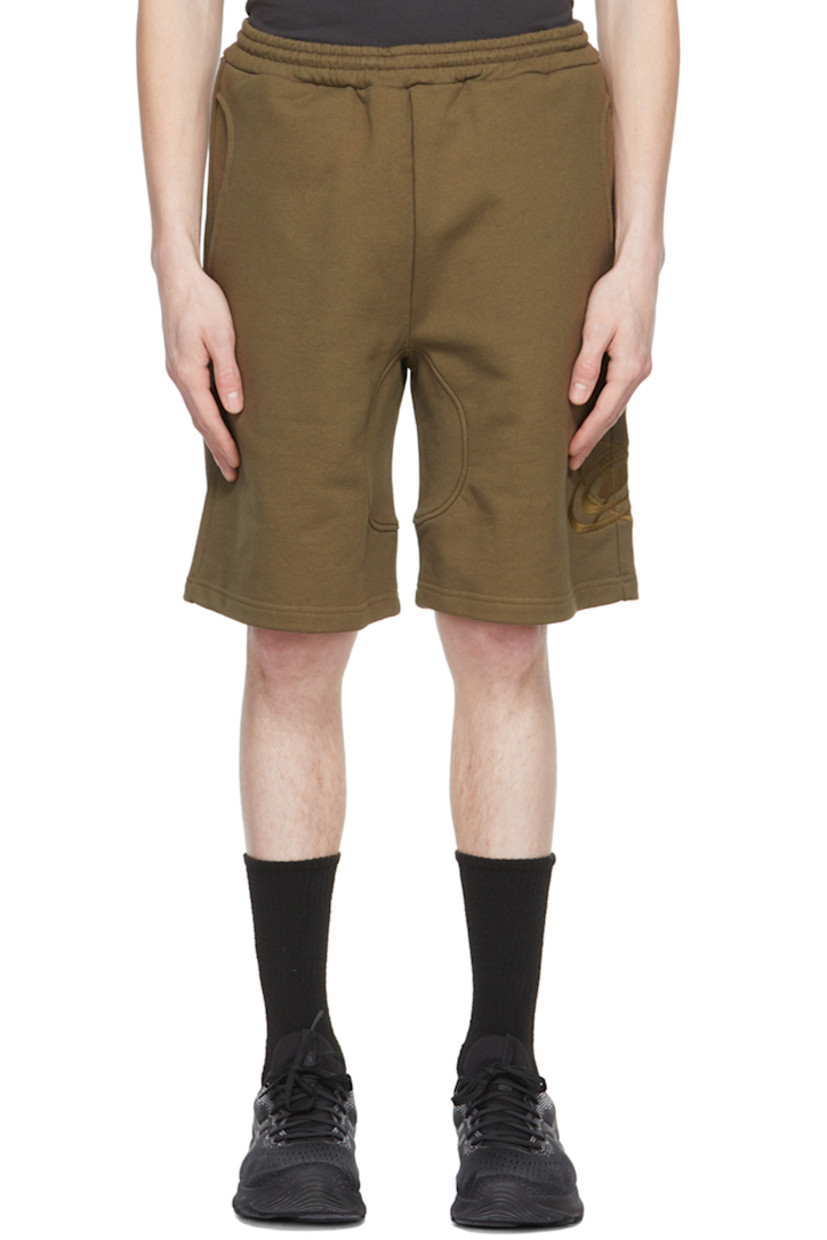 French terry shorts.

· Concealed bungee-style drawstring at elasticized waistband
· Logo graphic embroidered at outseam
· Two-pocket styling

Supplier color: Mud
