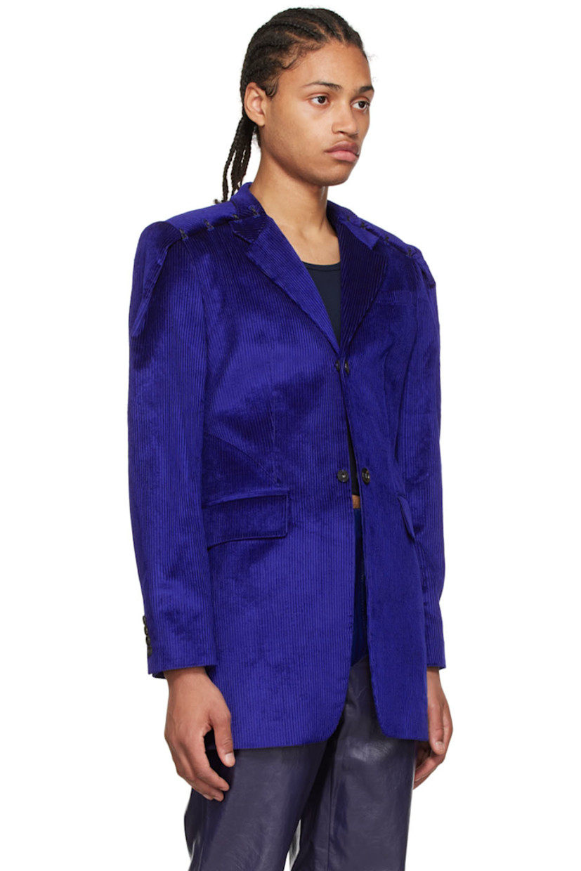 Cotton corduroy blazer. 

· Notched lapel
· Button closure
· Hook-eye fastening at shoulders
· Welt pocket and flap pockets
· Central vent at back hem
· Full viscose satin lining

Supplier color: Dark blue