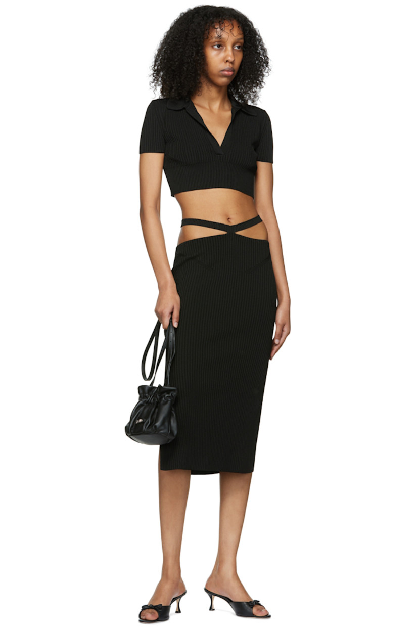 Rib knit viscose polo. V-neck at spread collar. 

Supplier color: Black