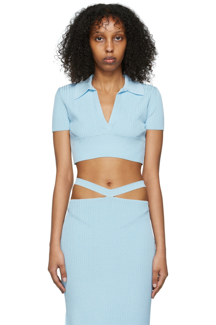 Rib knit viscose polo. V-neck at spread collar. 

Supplier color: Baby blue