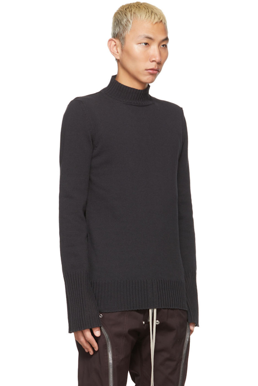 Long sleeve knit recycled cotton sweater in black. Rib knit turtleneck collar, cuffs, and hem.

Supplier color: Black