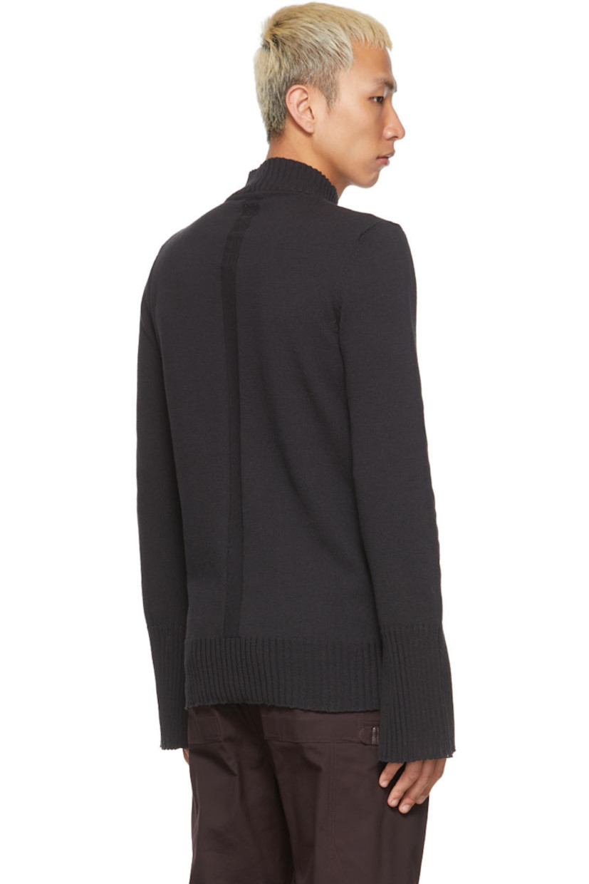 Long sleeve knit recycled cotton sweater in black. Rib knit turtleneck collar, cuffs, and hem.

Supplier color: Black