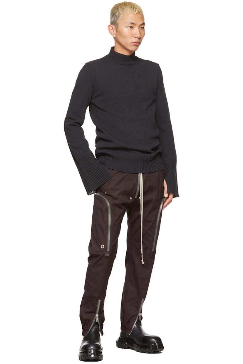 Long sleeve knit recycled cotton sweater in black. Rib knit turtleneck collar, cuffs, and hem.

Supplier color: Black