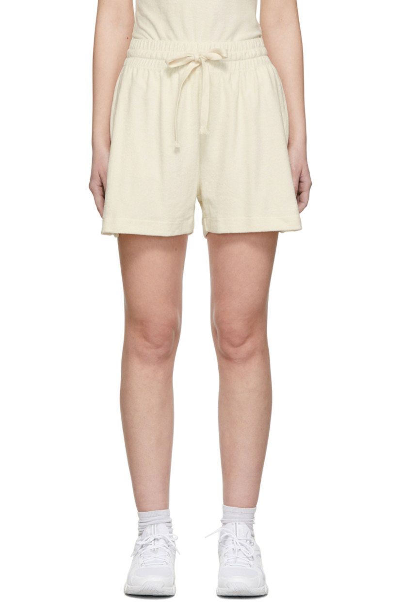 Cotton and nylon-blend terry shorts in off-white. Logo embroidered in navy at front.


· High-rise
· Three-pocket styling
· Drawstring at elasticized waistband
· Vented side-seams

Supplier color: Burro/Cream