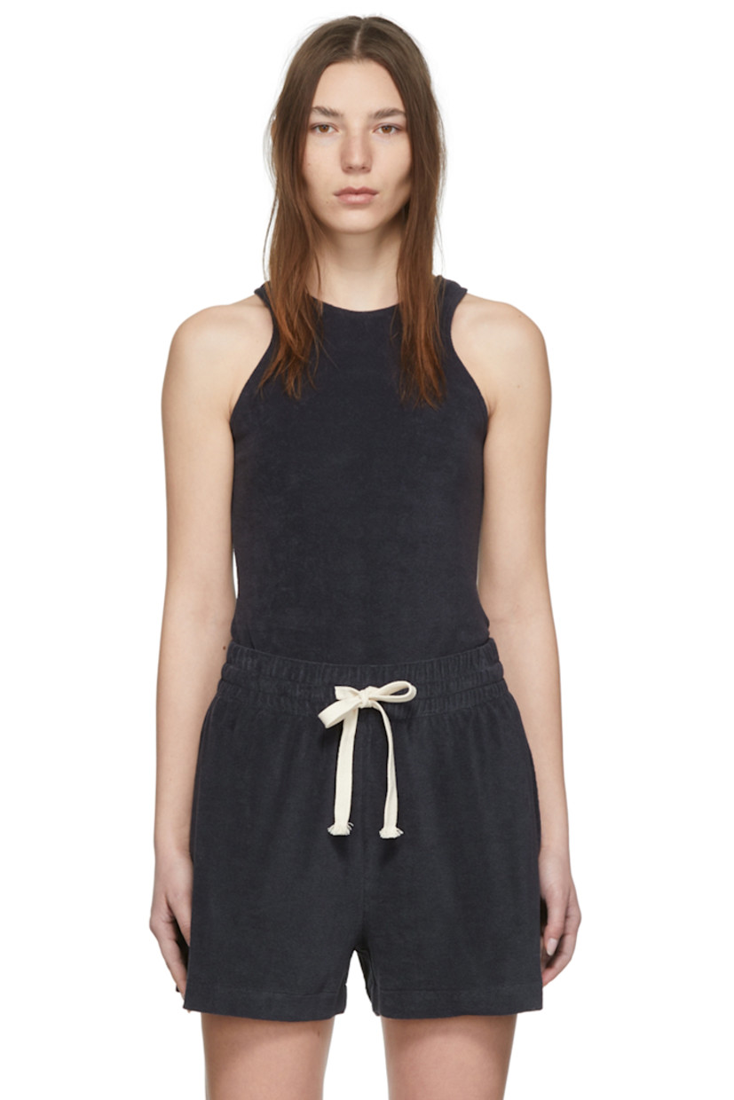Sleeveless cotton and nylon-blend terrycloth bodysuit in navy. Logo embroidered in white at back collar. 

· Crewneck collar
· Press-stud closure at bottom
· Cut-out at back

Supplier color: Navy