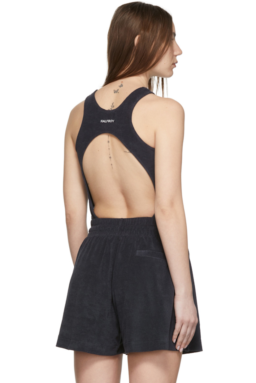 Sleeveless cotton and nylon-blend terrycloth bodysuit in navy. Logo embroidered in white at back collar. 

· Crewneck collar
· Press-stud closure at bottom
· Cut-out at back

Supplier color: Navy