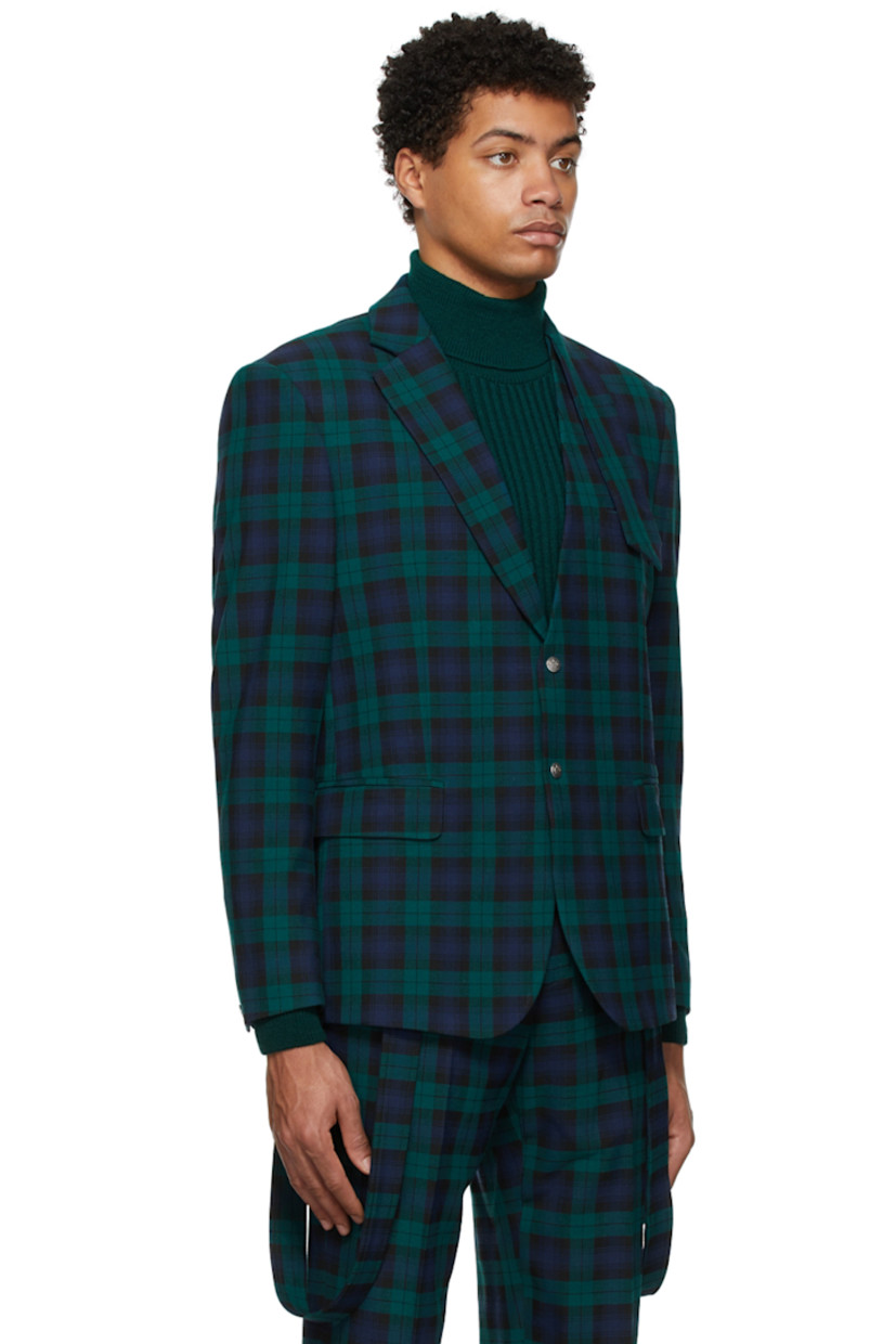 Long sleeve wool twill blazer featuring check pattern in navy, green, and black.

· Modified notched lapel collar
· Two-button closure at front
· Flap pockets at waist
· Fully lined

Supplier color: Green/Navy