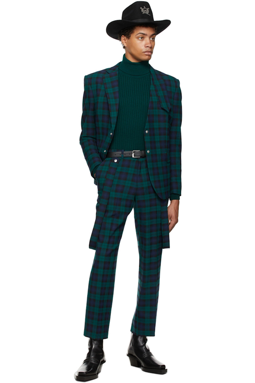 Long sleeve wool twill blazer featuring check pattern in navy, green, and black.

· Modified notched lapel collar
· Two-button closure at front
· Flap pockets at waist
· Fully lined

Supplier color: Green/Navy