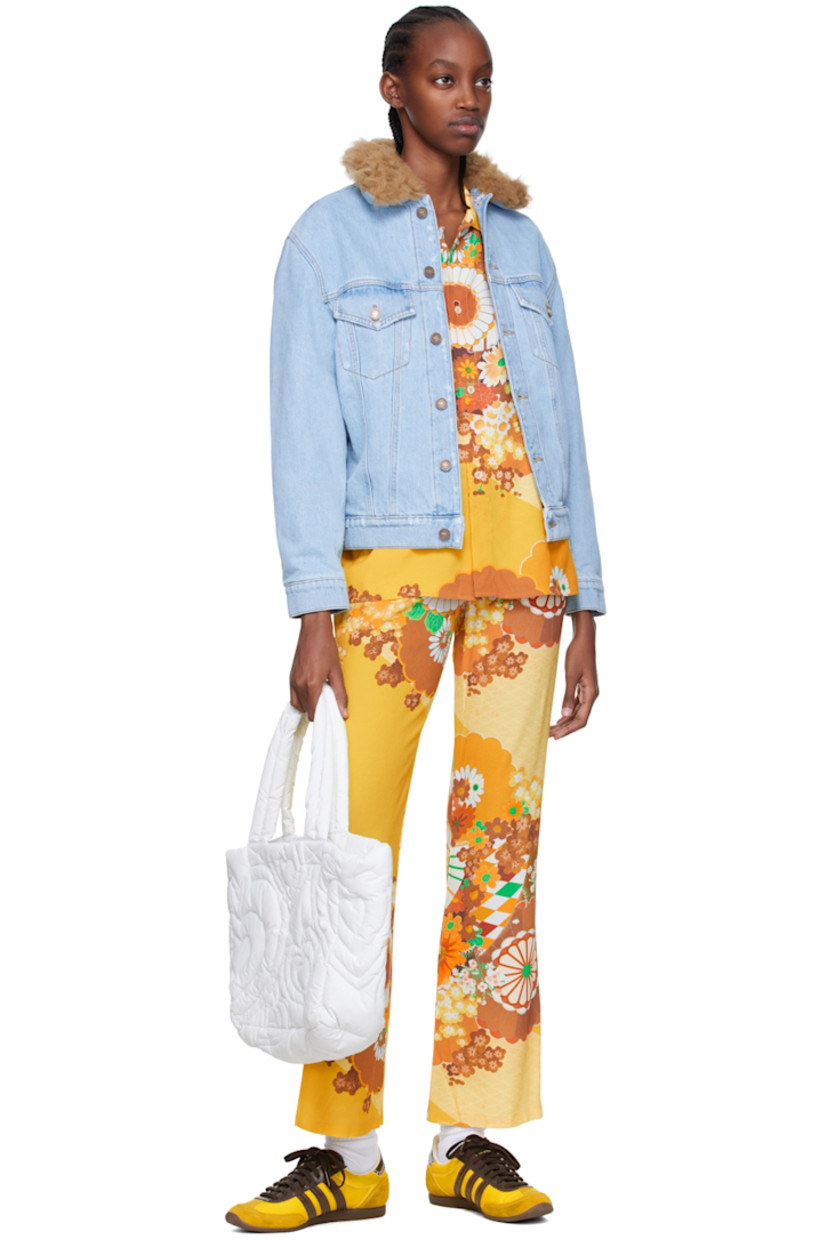 Viscose-blend crepe lounge pants. Graphic pattern printed throughout.

· Elasticized waistband
· Metallic thread topstitching at outseams

Supplier color: Yellow