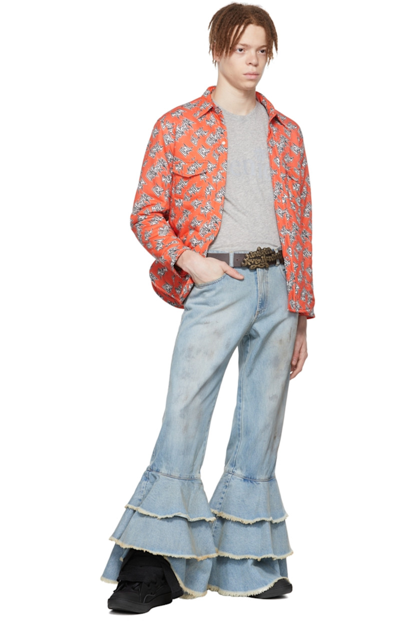 Insulated cotton jersey shirt. Logo graphic printed throughout.

· Spread collar
· Press-stud closure
· Flap pockets
· Vented side-seams
· Single-press-stud barrel cuffs
· Mother-of-pearl hardware

Supplier color: Orange