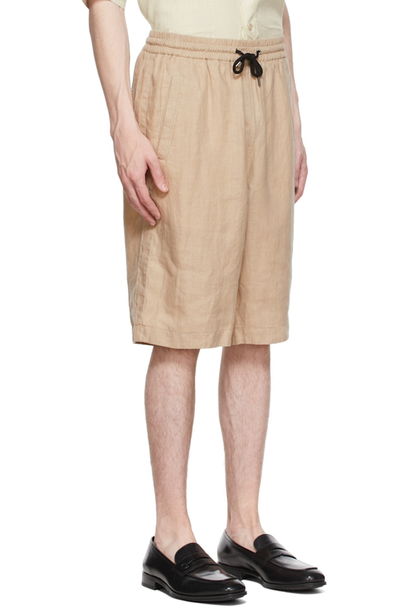 Plain-woven hemp shorts. 

· Drawstring at elasticized waistband 
· Pleats at front
· Three-pocket styling 
· Partial cotton lining

Supplier color: Nude