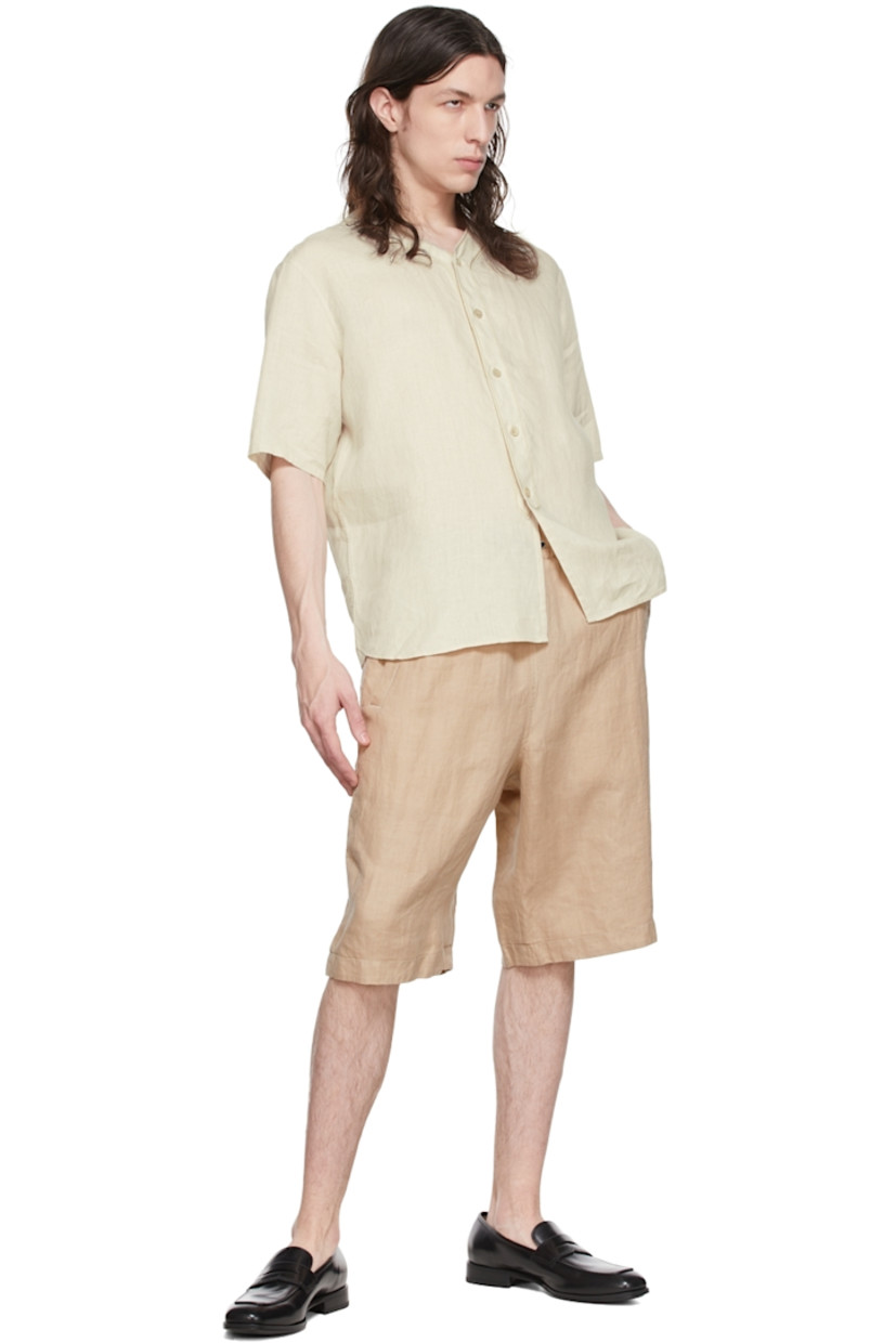 Plain-woven hemp shorts. 

· Drawstring at elasticized waistband 
· Pleats at front
· Three-pocket styling 
· Partial cotton lining

Supplier color: Nude