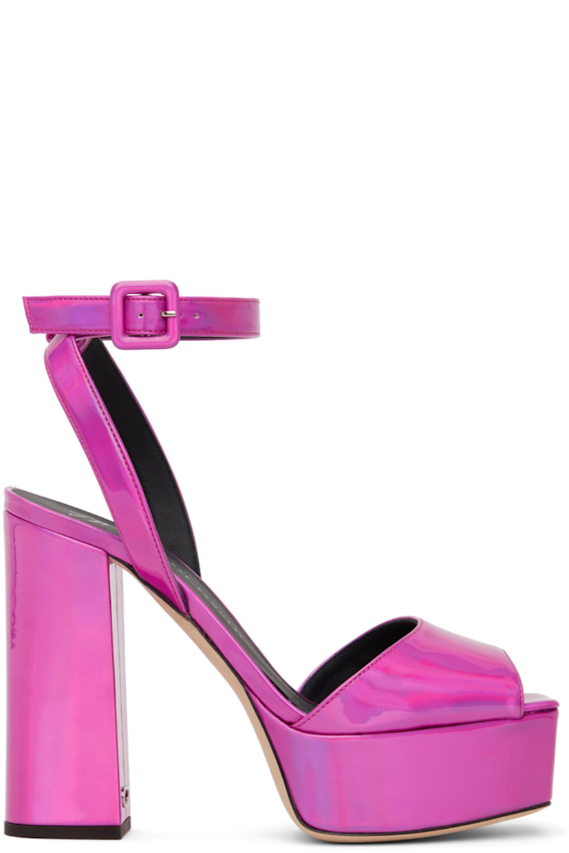 Iridescent patent faux-leather heeled sandals in pink.

· Open square toe
· Adjustable ankle strap with pin-buckle fastening 
· Logo stamped at buffed leather footbed
· Buffed leather lining in black
· Silver-tone logo hardware at covered block heel
· Leather outsole in beige
· Heel: H4.75 in

Supplier color: Fuchsia