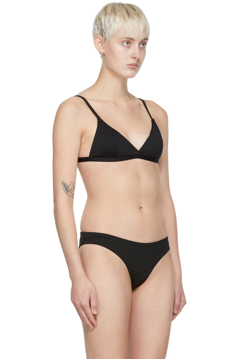 Stretch nylon jersey bikini top. 

· Fixed shoulder straps
· Removable padding at cups
· Darts at chest
· Self-tie fastening at back
· Full jersey lining

Supplier color: Black