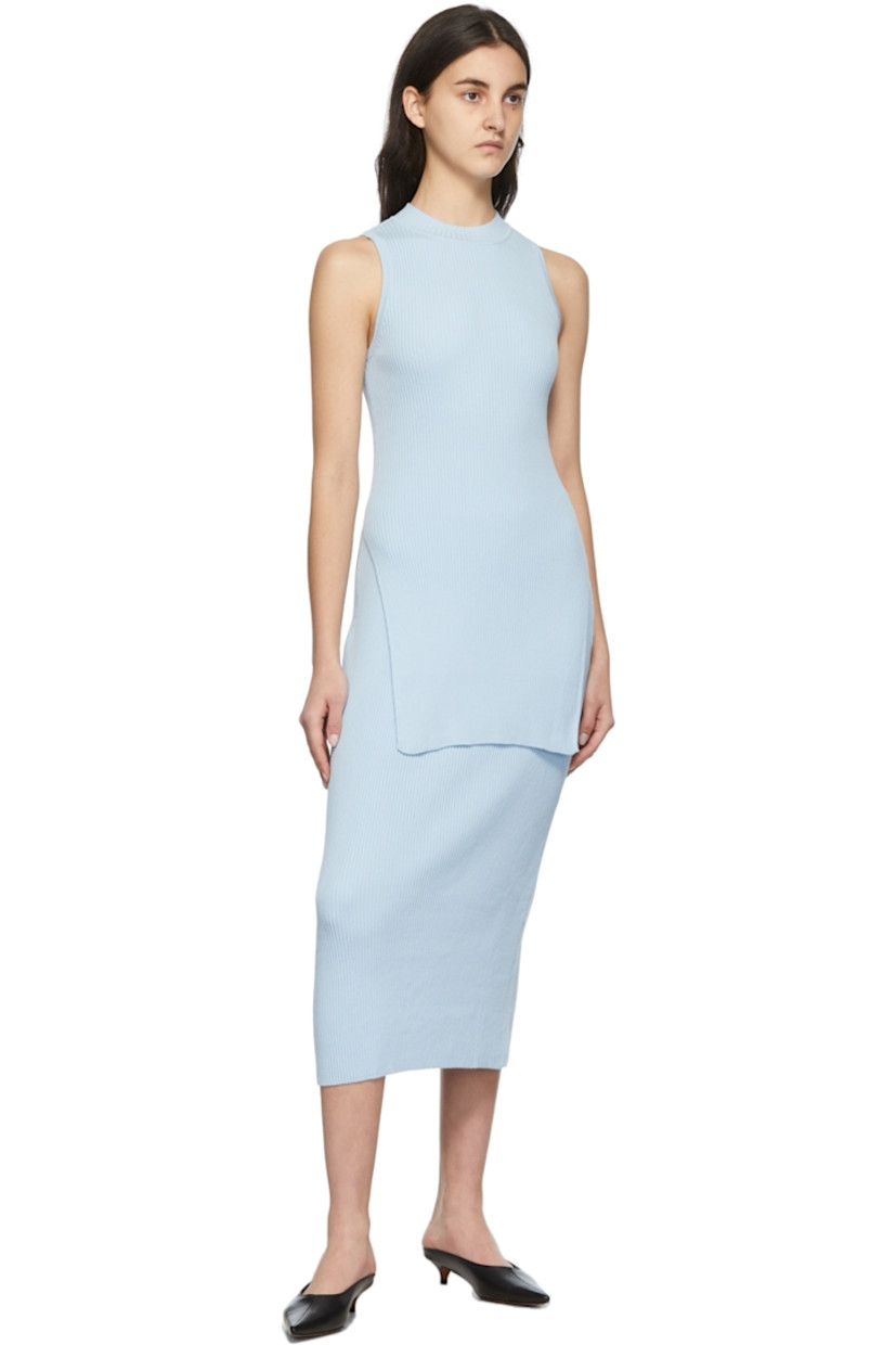 Rib knit cotton-blend tank top in blue. 

· Mock neck collar
· Vented side-seams

Supplier color: Light blue