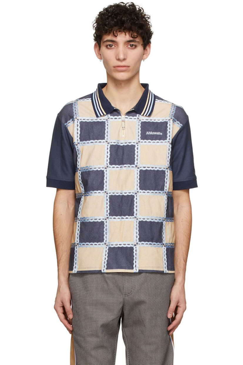 Organic cotton piqué polo.

· Striped open spread collar
· Quarter-zip closure
· Logo embroidered at chest
· Check pattern and embroidered detailing at front
· Vented side-seams

Supplier color: Beige/Blue/Navy