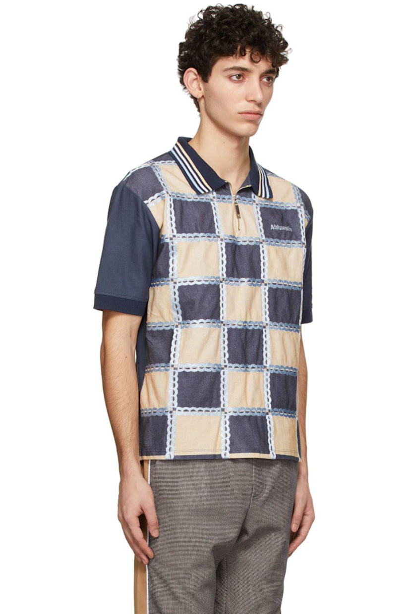 Organic cotton piqué polo.

· Striped open spread collar
· Quarter-zip closure
· Logo embroidered at chest
· Check pattern and embroidered detailing at front
· Vented side-seams

Supplier color: Beige/Blue/Navy