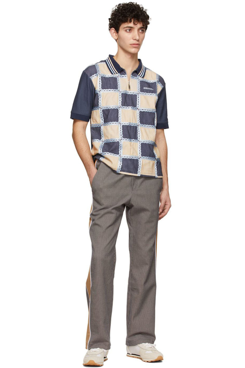 Organic cotton piqué polo.

· Striped open spread collar
· Quarter-zip closure
· Logo embroidered at chest
· Check pattern and embroidered detailing at front
· Vented side-seams

Supplier color: Beige/Blue/Navy