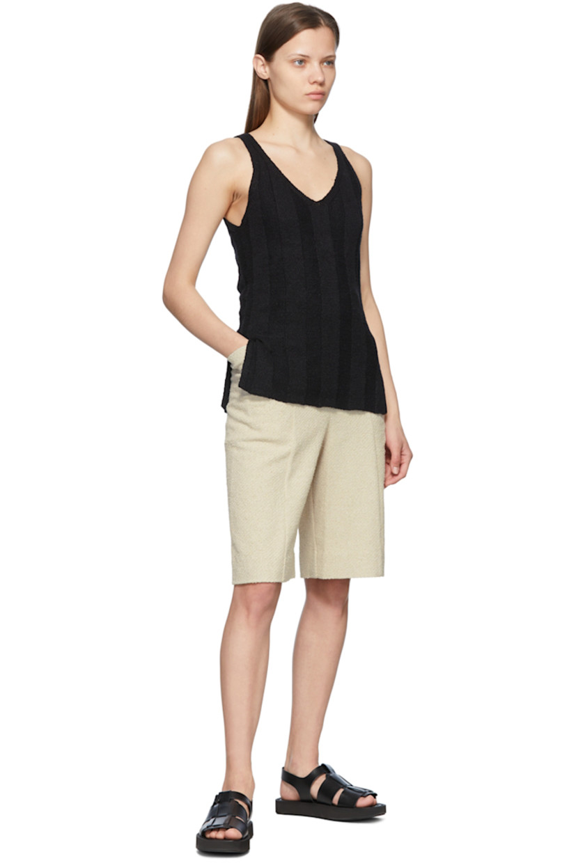 Recycled cotton-blend tweed shorts.

· Mid-rise
· Belt loops
· Zip-fly
· Two-pocket styling

Supplier color: Cement