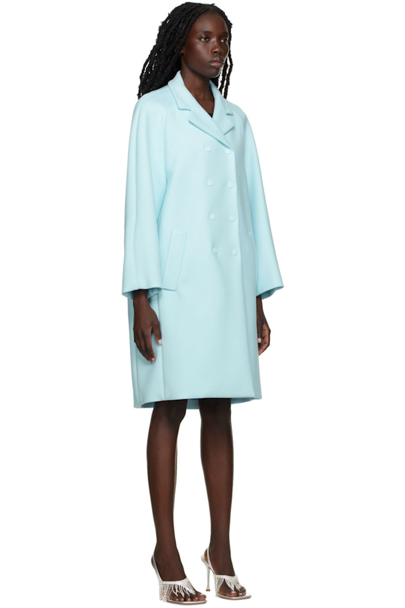 Long sleeve stretch viscose and nylon-blend twill coat in blue.

· Notched lapel collar
· Double-breasted button closure
· Welt pockets at waist
· Crystal-cut logo appliqué at back collar
· Unlined

Supplier color: Blue