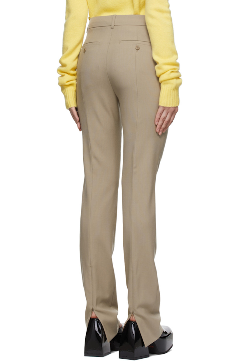 Straight-leg virgin wool twill trousers in tan.

· Mid-rise
· Concealed zippered vent at cuffs

Supplier color:Turtledove