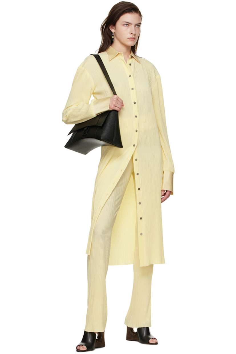 Garment-pleated polyester satin dress.

· Spread collar
· Button closure
· Vented cuffs
· Logo-engraved silver-tone hardware

Supplier color: Eggshell