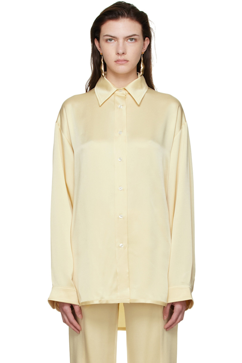 Acetate and viscose-blend satin shirt.

· Spread collar
· Button closure
· Vented side-seams
· Logo embroidered at cuff
· Single-button barrel cuffs
· Shirttail hem

Supplier color: Cream