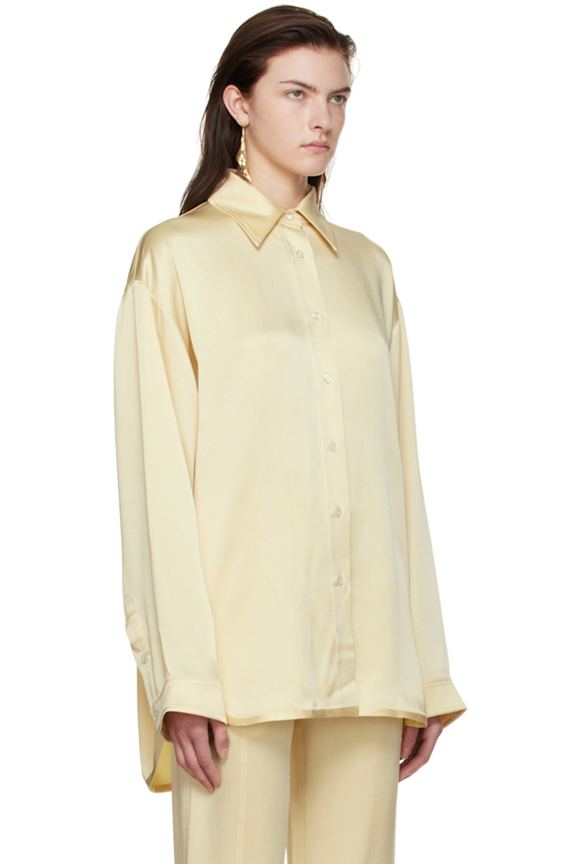 Acetate and viscose-blend satin shirt.

· Spread collar
· Button closure
· Vented side-seams
· Logo embroidered at cuff
· Single-button barrel cuffs
· Shirttail hem

Supplier color: Cream