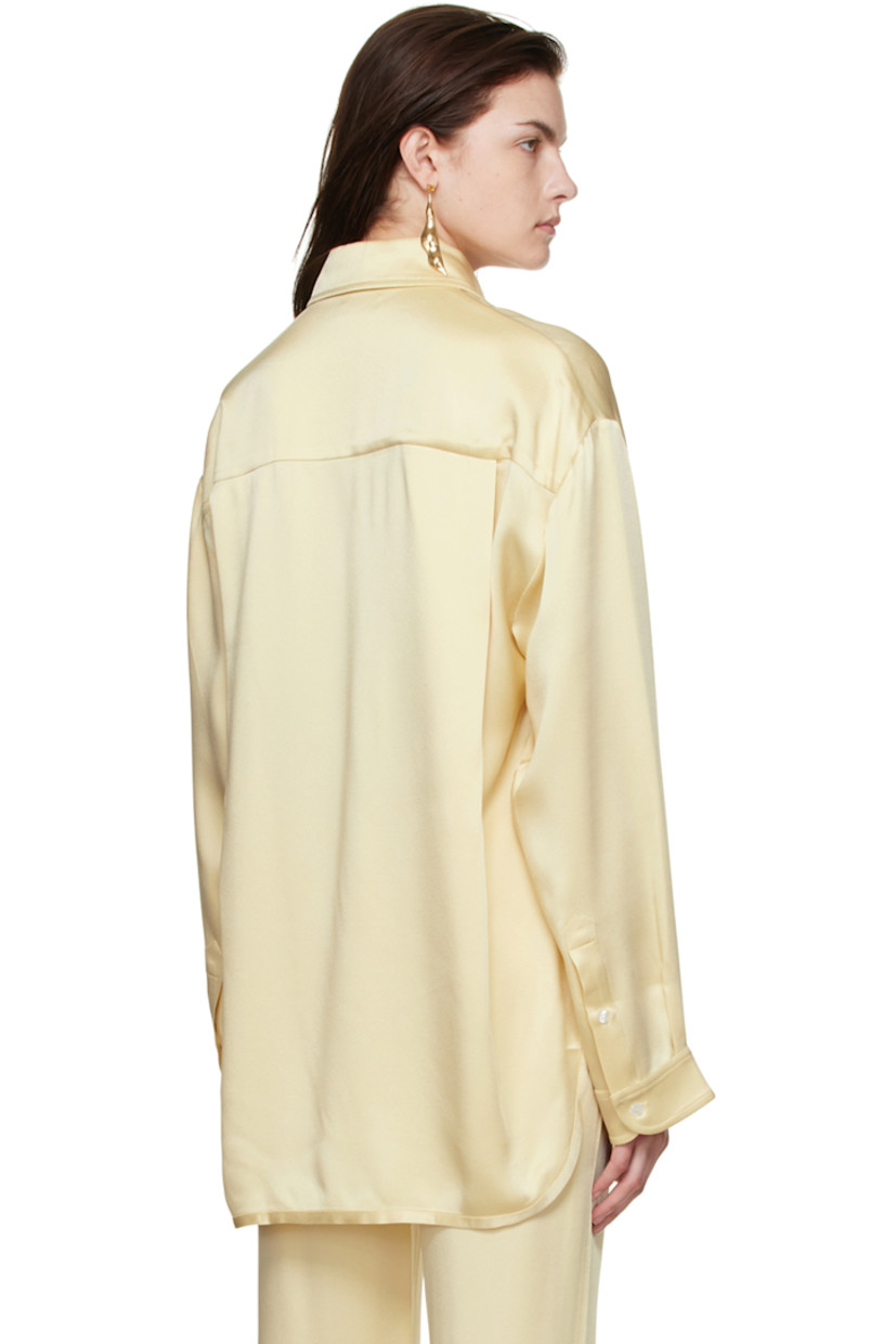 Acetate and viscose-blend satin shirt.

· Spread collar
· Button closure
· Vented side-seams
· Logo embroidered at cuff
· Single-button barrel cuffs
· Shirttail hem

Supplier color: Cream