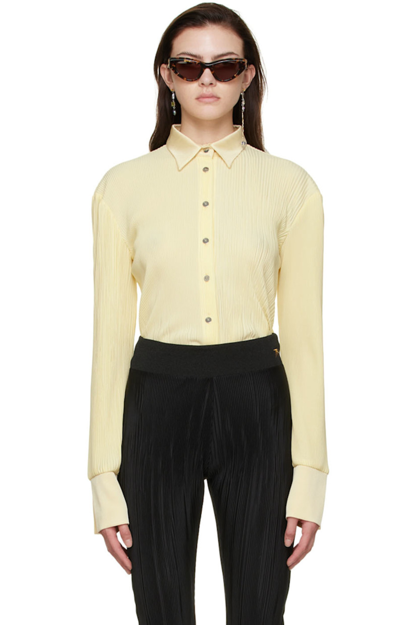 Garment-pleated polyester satin shirt.

· Spread collar
· Button closure
· Vented cuffs
· Shirttail hem
· Logo-engraved silver-tone hardware

Supplier color: Eggshell
